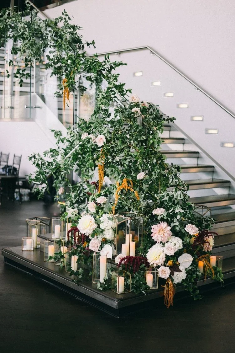 Wedding staircase decorated with flowers and candles